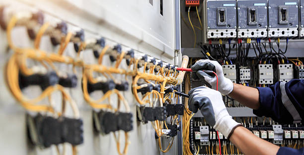 Professional Electrician technician working in Forest City, IA